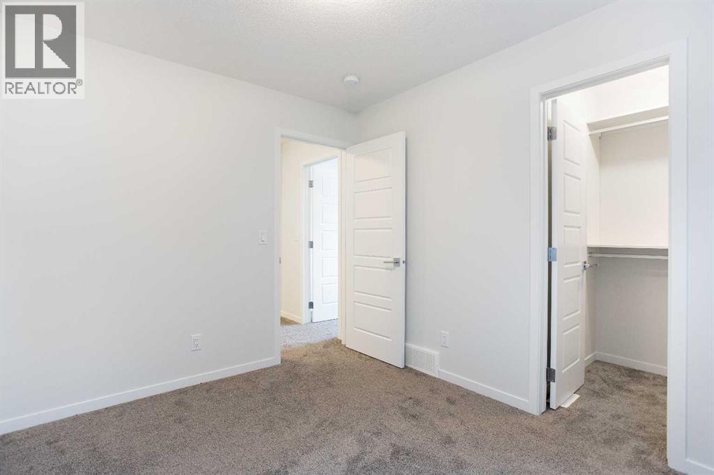 16 Creekstone Drive Sw, Calgary, Alberta  T2X 4Z5 - Photo 26 - A2281800