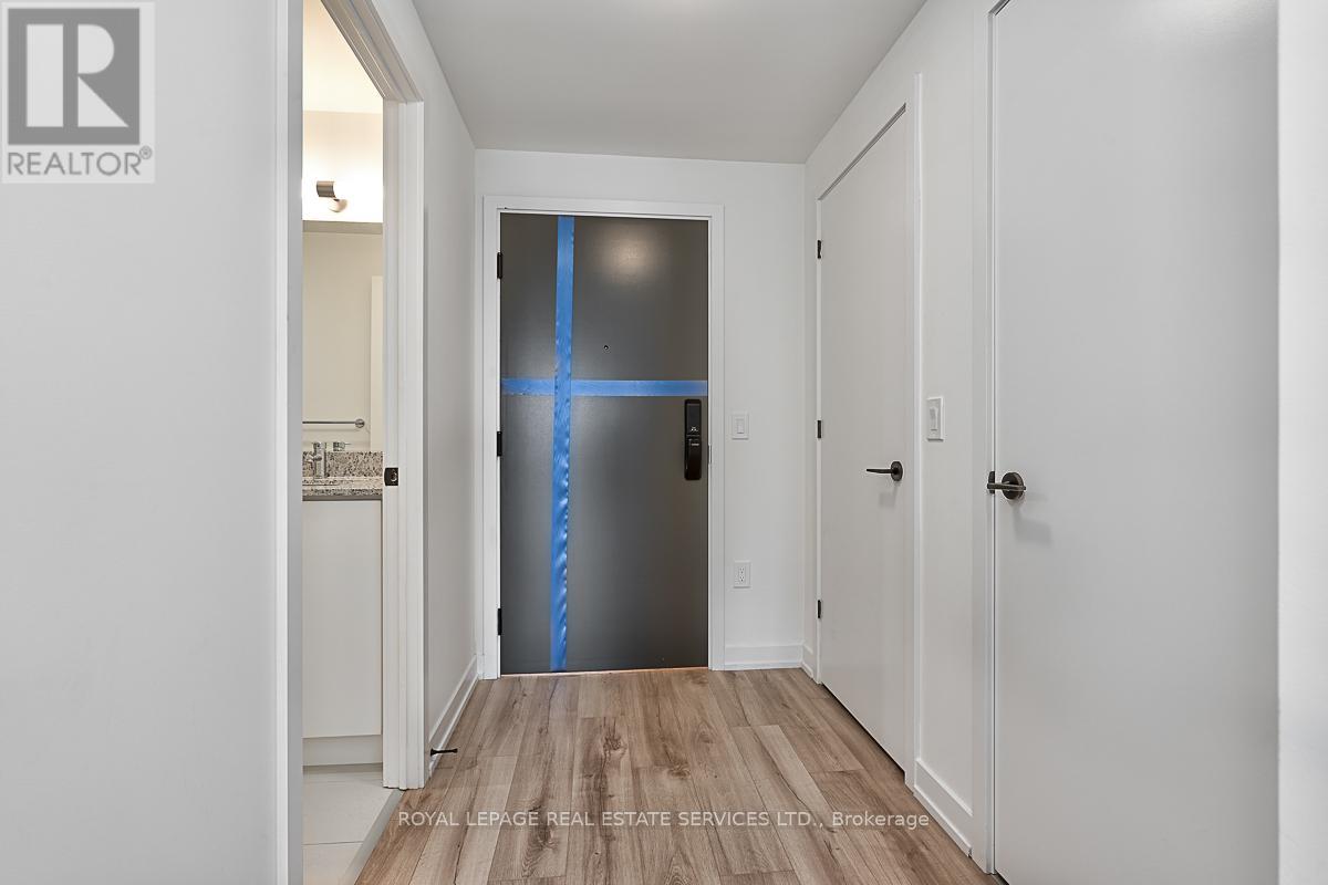 202 - 345 Wheat Boom Drive, Oakville, Ontario  L6H 7X4 - Photo 2 - W12916046