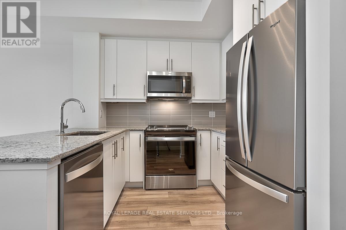 202 - 345 Wheat Boom Drive, Oakville, Ontario  L6H 7X4 - Photo 3 - W12916046