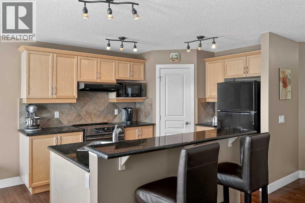 228 Westmount Crescent, Okotoks, Alberta  T1S 2J2 - Photo 13 - A2291911