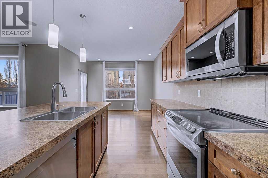 244 Eversyde Mews SW, Calgary, Alberta  T2Y 5E2 - Photo 9 - A2287075