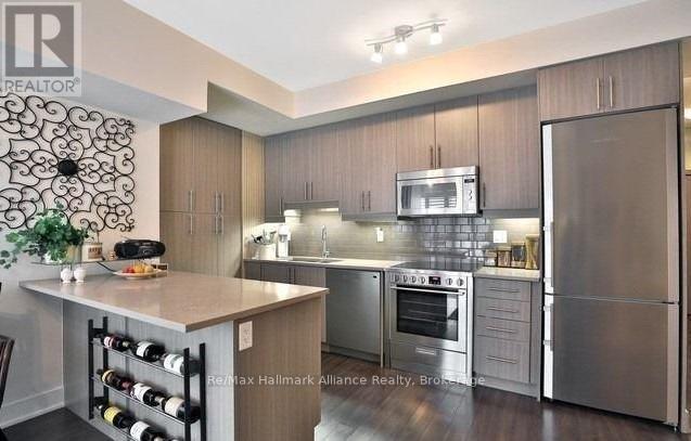 115 - 128 Garden Drive, Oakville, Ontario  L6K 0H7 - Photo 8 - W12916638