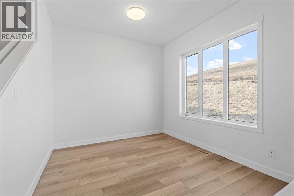 1135 Fowler Road, Airdrie, Alberta  T4B 5M3 - Photo 6 - A2295479