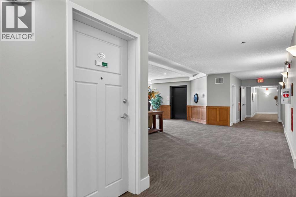 203, 77 George Fox Trail, Cochrane, Alberta  T4C 0N1 - Photo 47 - A2295000