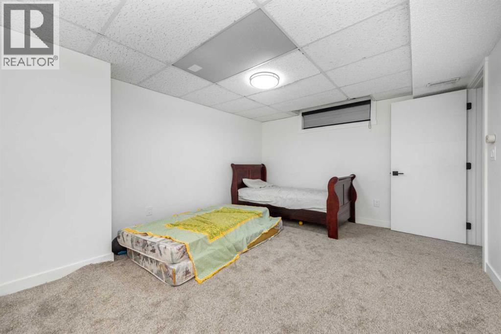 133 Woodbrook Road Sw, Calgary, Alberta  T2W 6C6 - Photo 39 - A2280043