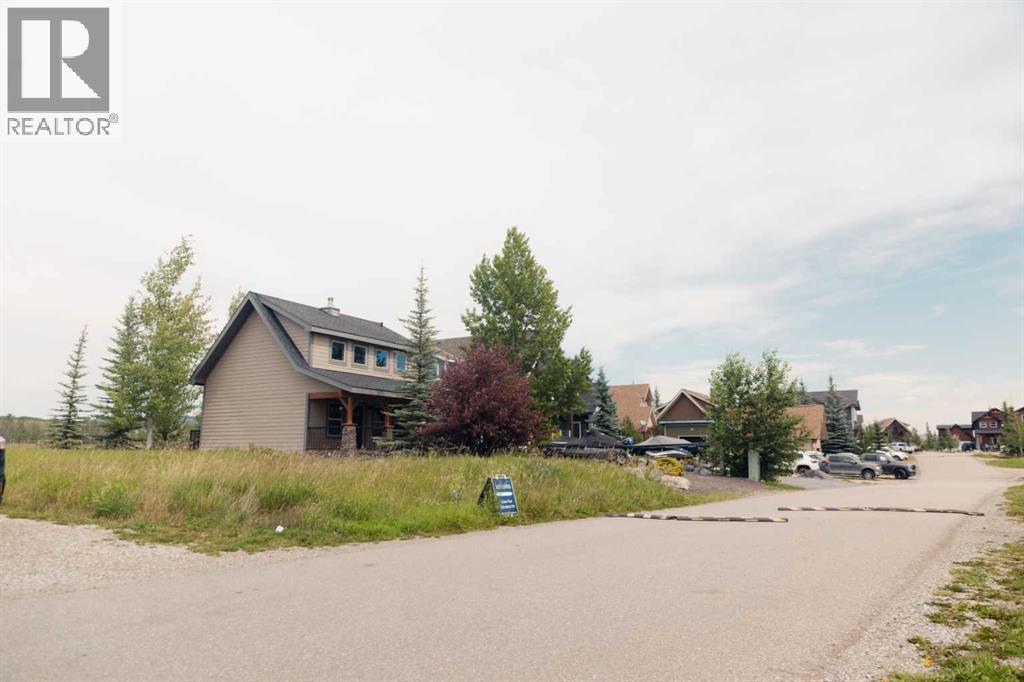 236 Cottage Club Crescent, Rural Rocky View County, Alberta  T4C 1B1 - Photo 21 - A2245247