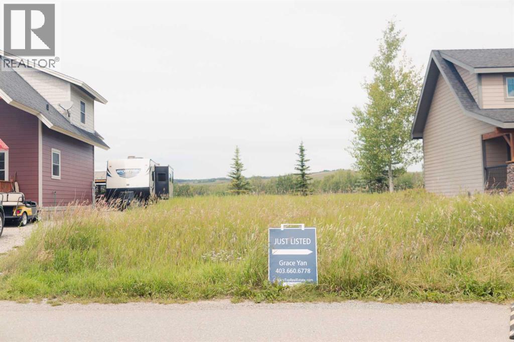 236 Cottage Club Crescent, Rural Rocky View County, Alberta  T4C 1B1 - Photo 20 - A2245247