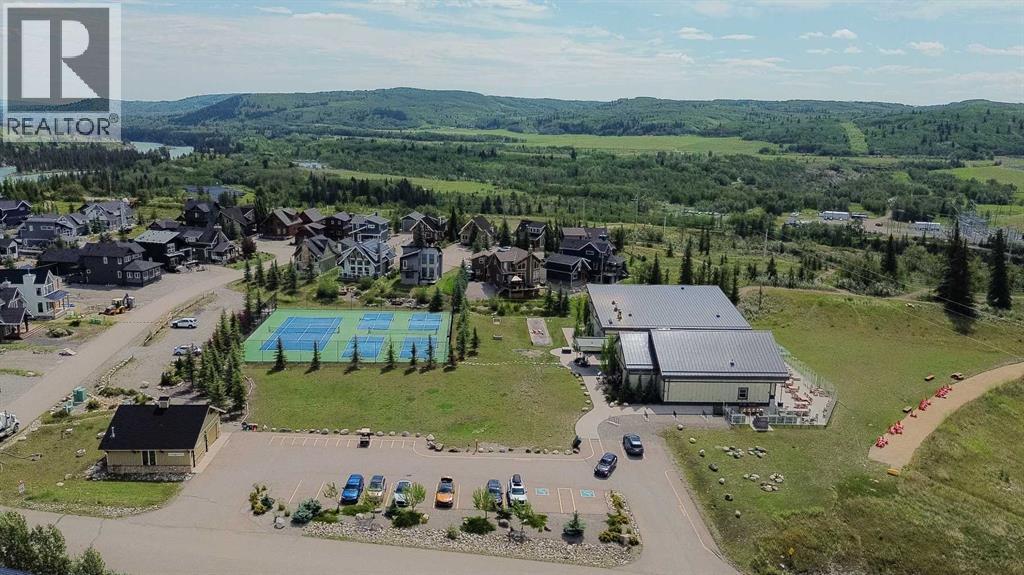 236 Cottage Club Crescent, Rural Rocky View County, Alberta  T4C 1B1 - Photo 23 - A2245247