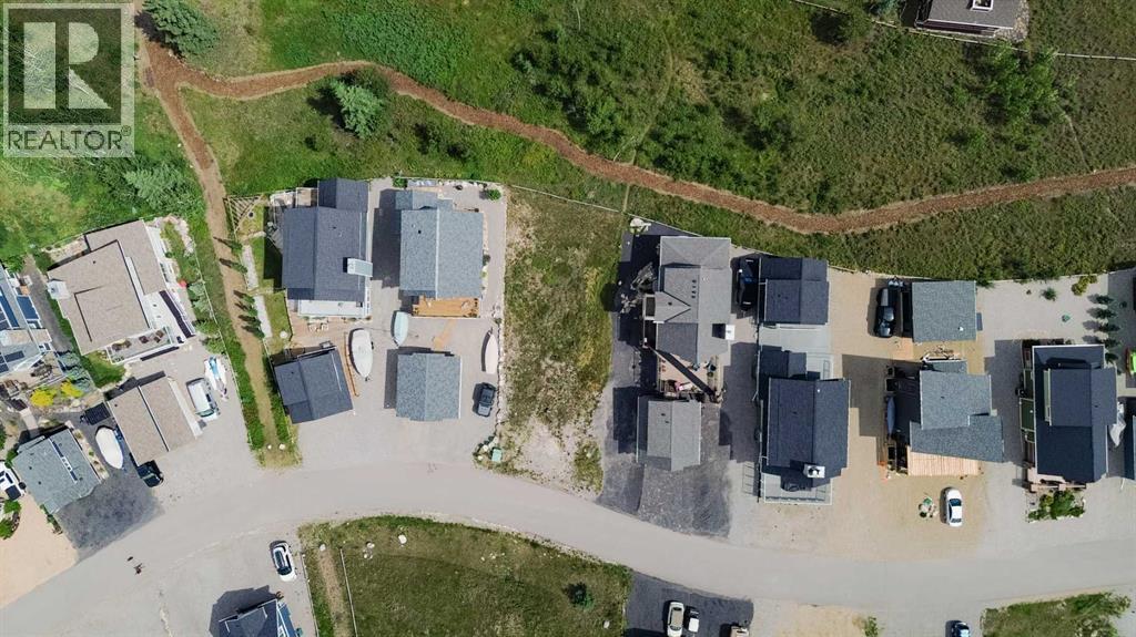 236 Cottage Club Crescent, Rural Rocky View County, Alberta  T4C 1B1 - Photo 25 - A2245247