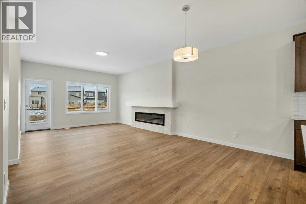 136 Wolf Hollow Manor Se, Calgary, Alberta  T2X 5R9 - Photo 6 - A2280309