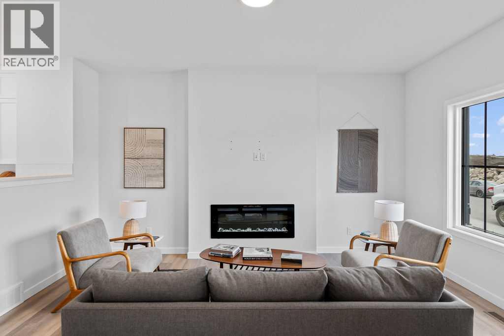 1037 Reynolds Crescent Sw, Airdrie, Alberta  T4B 5L8 - Photo 4 - A2201126