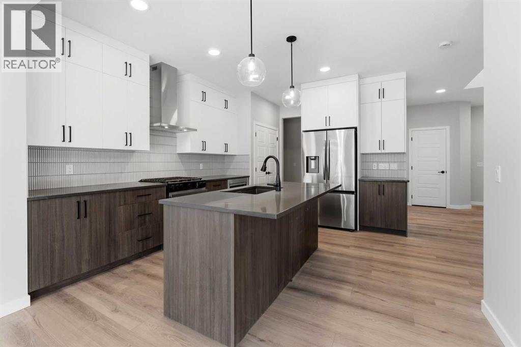 921 Chinook Winds Meadow Sw, Airdrie, Alberta  T4B 0R7 - Photo 4 - A2276943