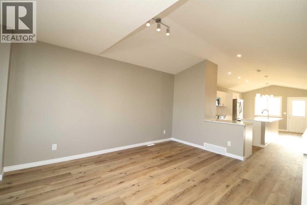 443 Henricks Drive, Irricana, Alberta  T0M 1G0 - Photo 4 - A2294712