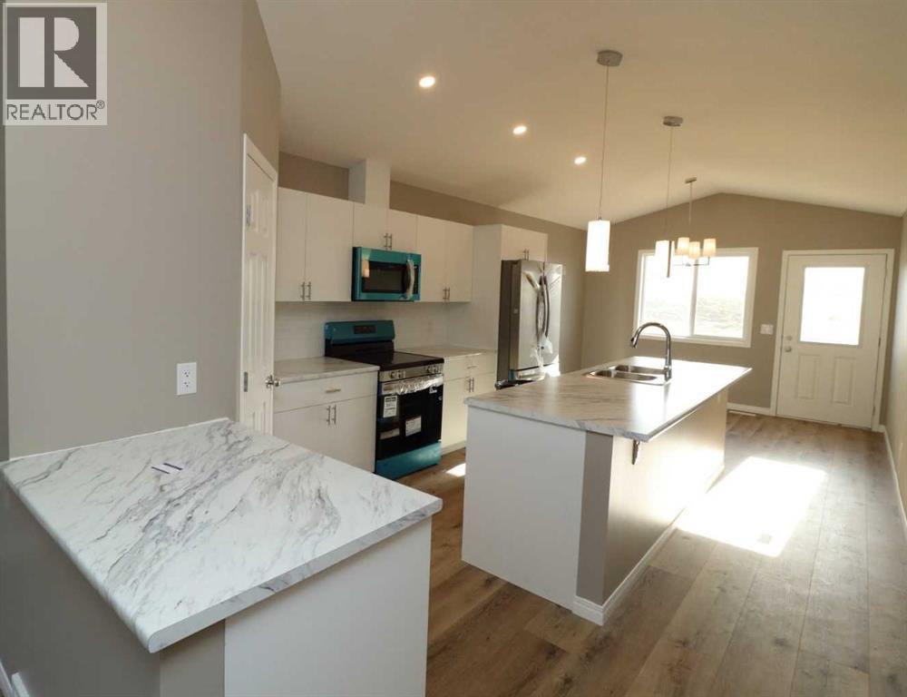 443 Henricks Drive, Irricana, Alberta  T0M 1G0 - Photo 5 - A2294712