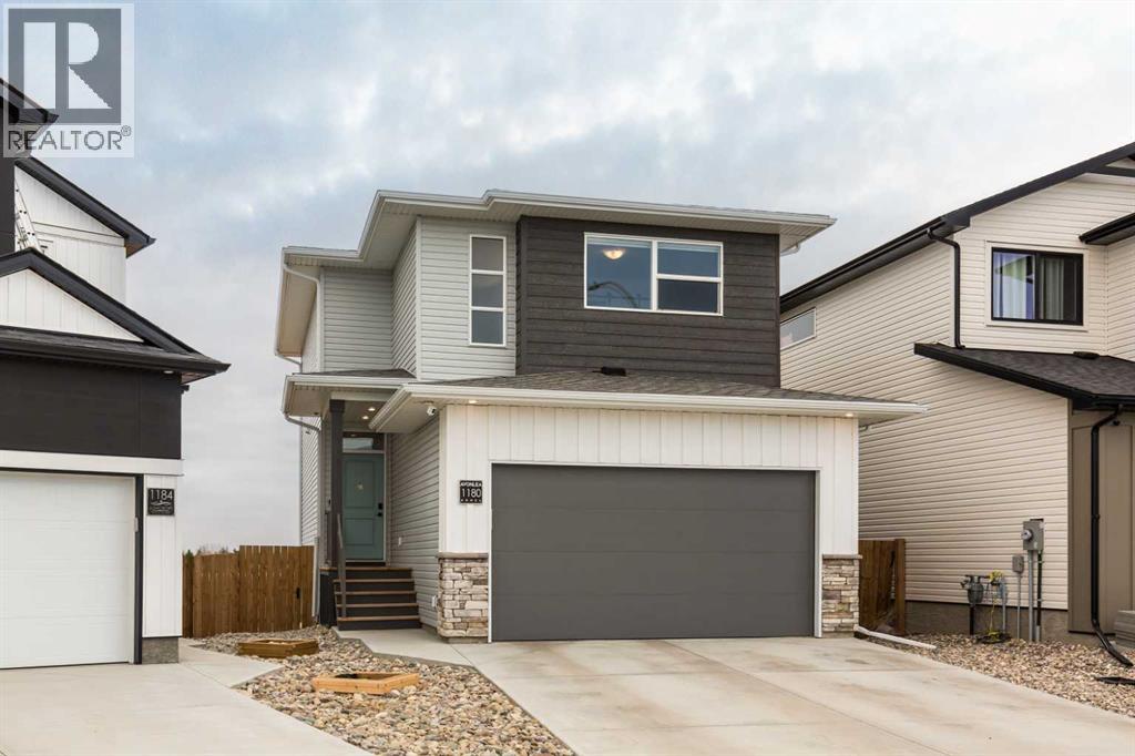 1180 Coalbrook Place W, Lethbridge, Alberta  T1J 5W7 - Photo 2 - A2295440