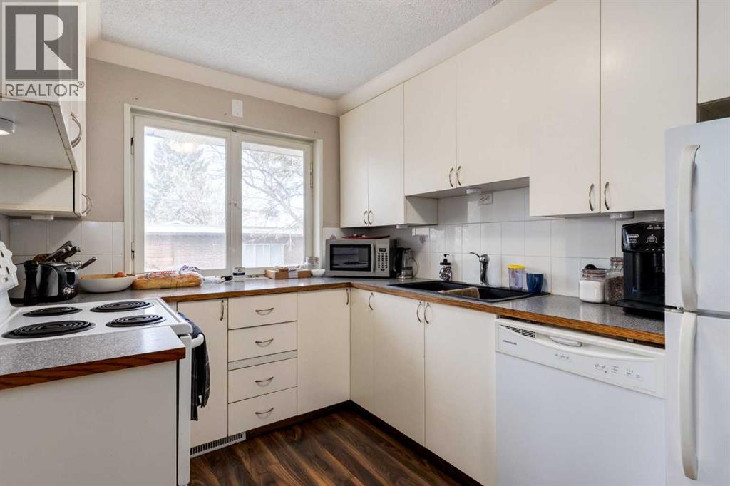 1415 43 Street Sw, Calgary, Alberta  T3C 2A3 - Photo 11 - A2294734