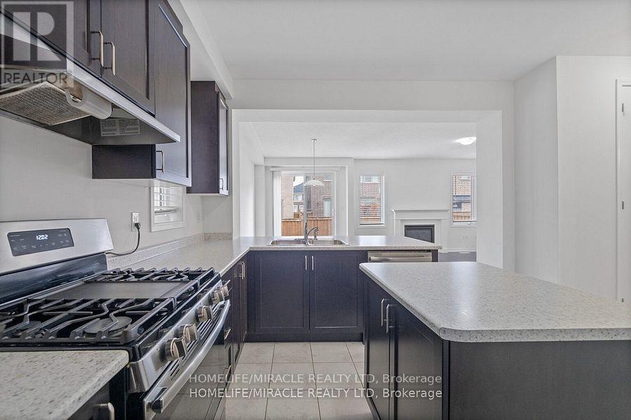 569 Fir Court, Milton, Ontario  L9E 1M5 - Photo 5 - W12917644