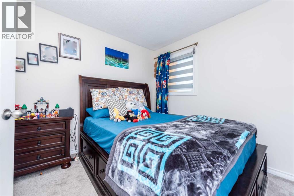 39 Tararidge Drive NE, Calgary, Alberta  T3J 2R4 - Photo 16 - A2296228