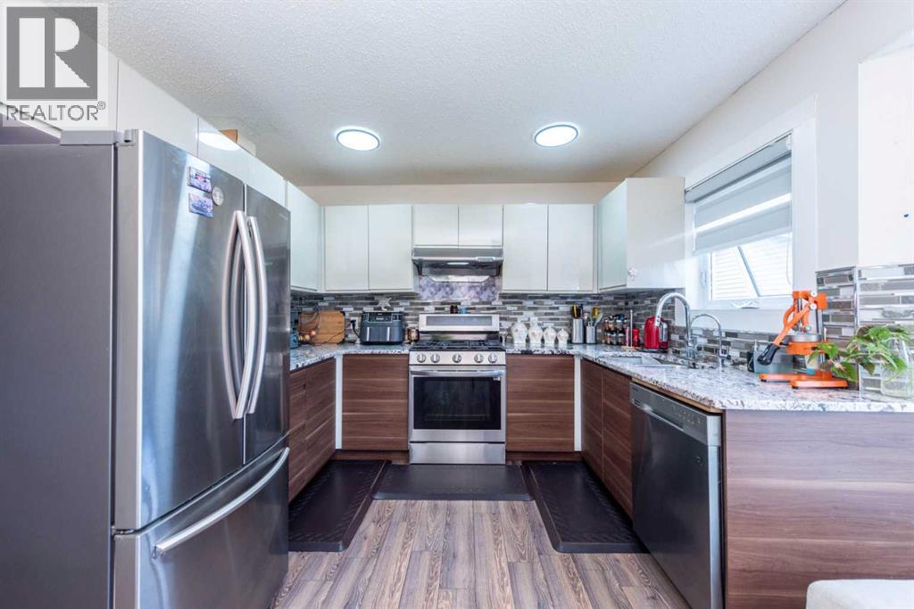 39 Tararidge Drive NE, Calgary, Alberta  T3J 2R4 - Photo 3 - A2296228