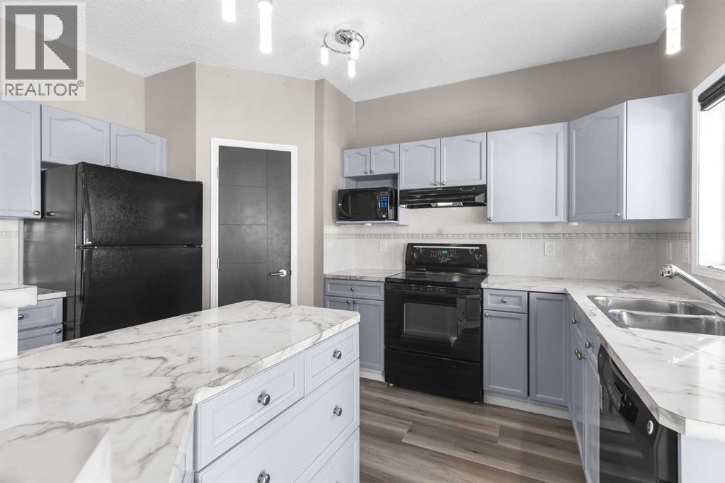 148 Stonegate Crescent Nw, Airdrie, Alberta  T4B 2S6 - Photo 9 - A2292451