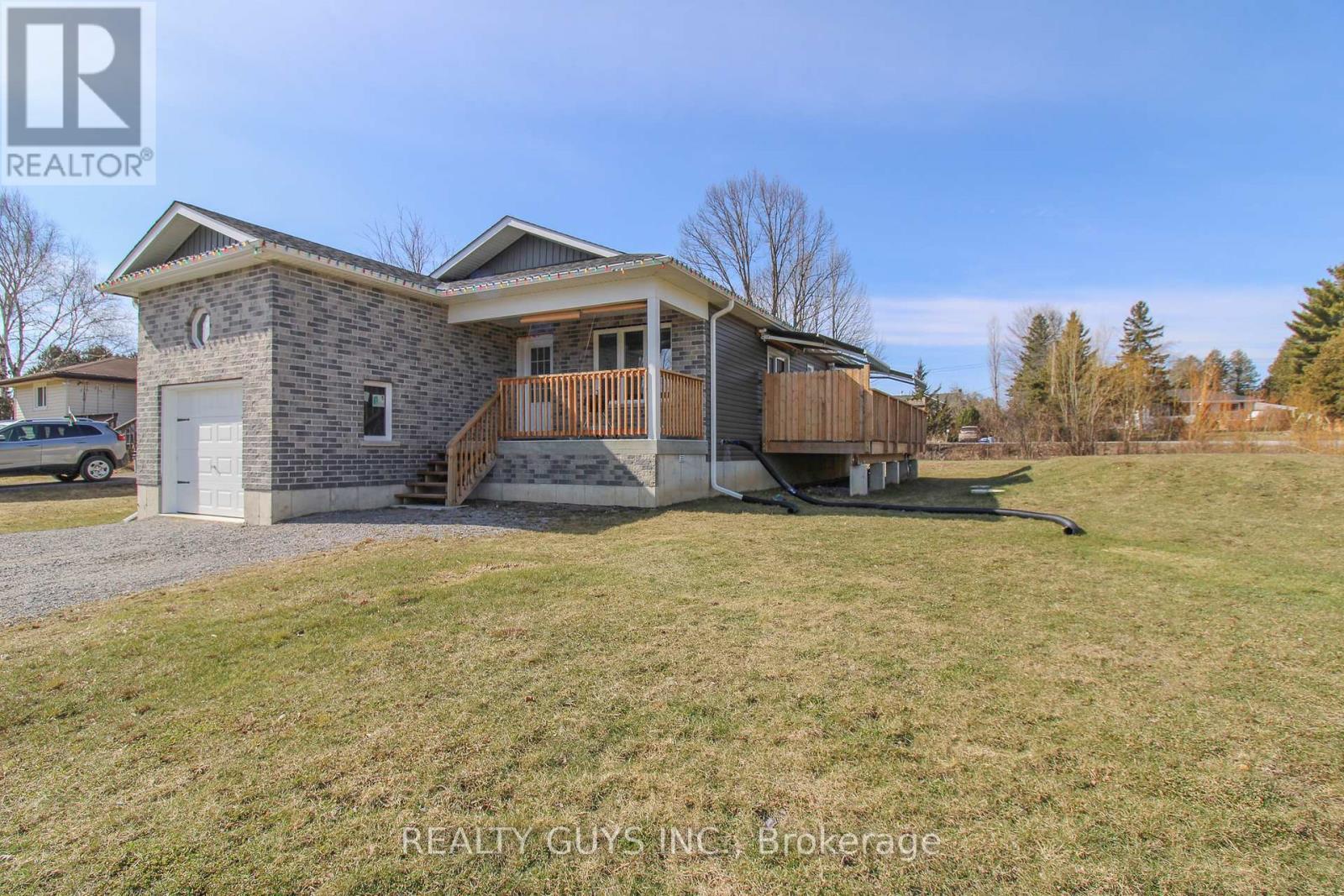 223 Crosby Drive, Kawartha Lakes, Ontario  K0M 1A0 - Photo 2 - X12917898