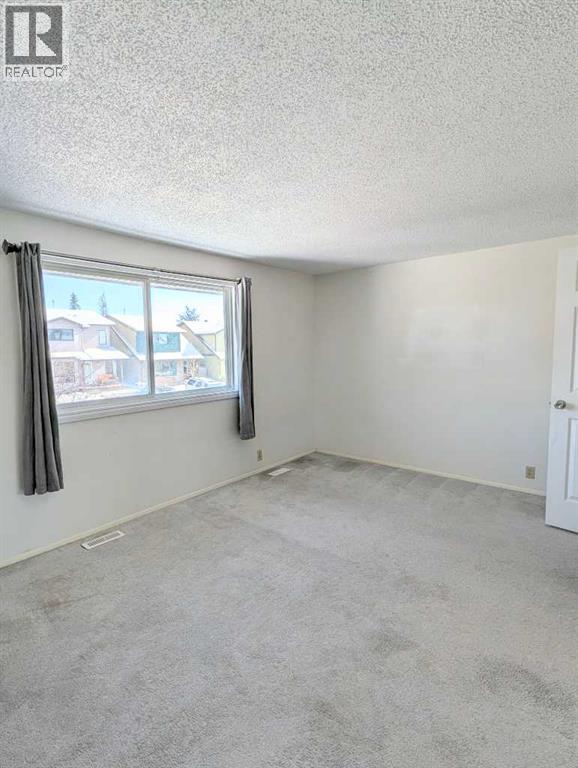 272 Abinger Crescent Ne, Calgary, Alberta  T2A 6L3 - Photo 12 - A2284543