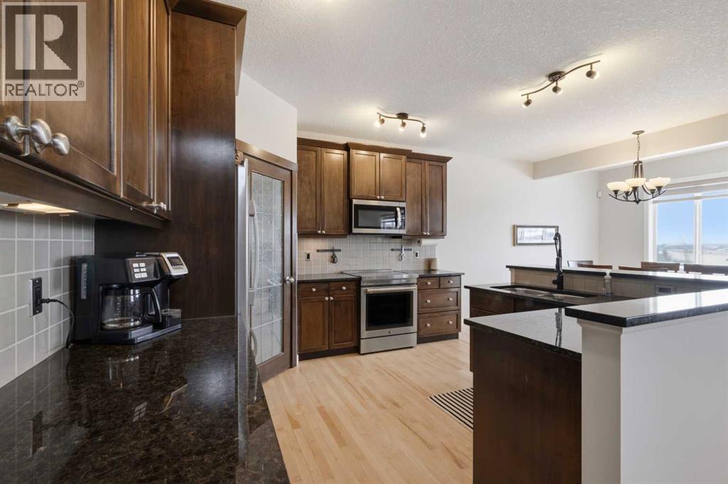 48 Heritage Green, Cochrane, Alberta  T4C 0L3 - Photo 12 - A2291764