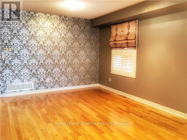 110 Deerwood Crescent, Richmond Hill, Ontario  L4E 4B3 - Photo 4 - N12918250