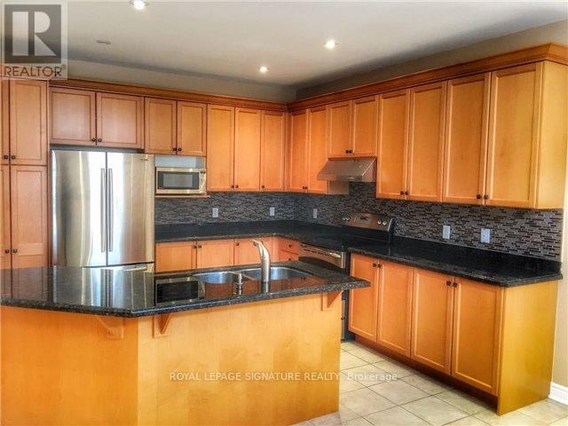 110 Deerwood Crescent, Richmond Hill, Ontario  L4E 4B3 - Photo 6 - N12918250