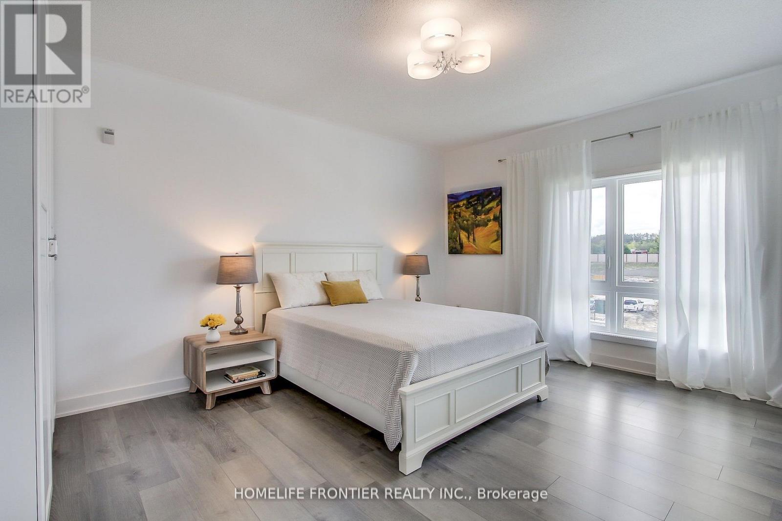 318 - 4 Spice Way, Barrie, Ontario  L9J 0M2 - Photo 17 - S12918322