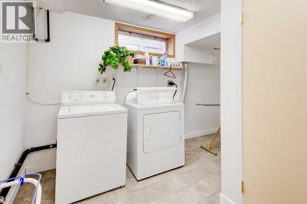 9 Mountain Place, Okotoks, Alberta  T1S 1G7 - Photo 31 - A2282183