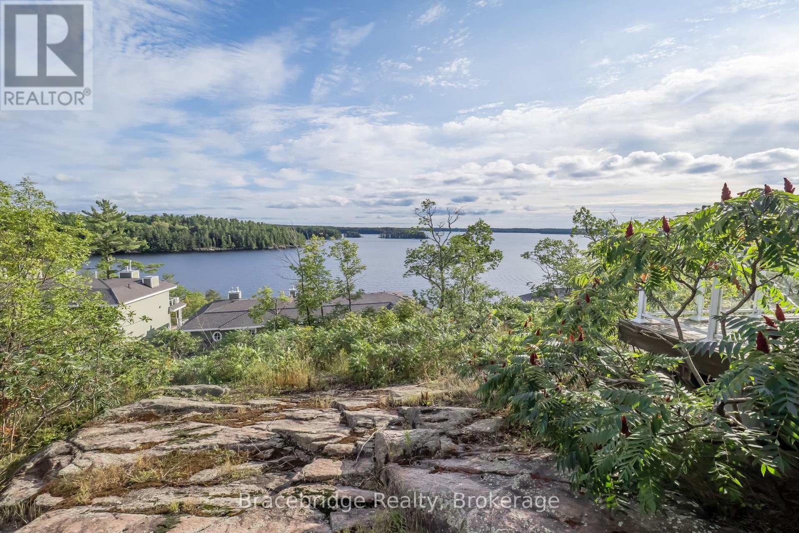 T301-C2 - 1869 Muskoka Rd 118 Highway W, Muskoka Lakes, Ontario P1L 1W8 - Photo 26 - X12918586