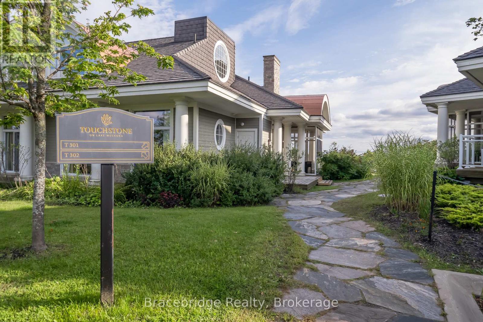 T301-C2 - 1869 Muskoka Rd 118 Highway W, Muskoka Lakes, Ontario P1L 1W8 - Photo 3 - X12918586