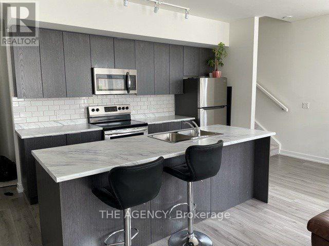 310 - 3058 Sixth Line, Oakville, Ontario  L6H 6C5 - Photo 5 - W12807898