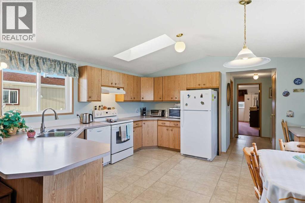 1, 900 Ross Street, Crossfield, Alberta  T0M 0S0 - Photo 5 - A2276345