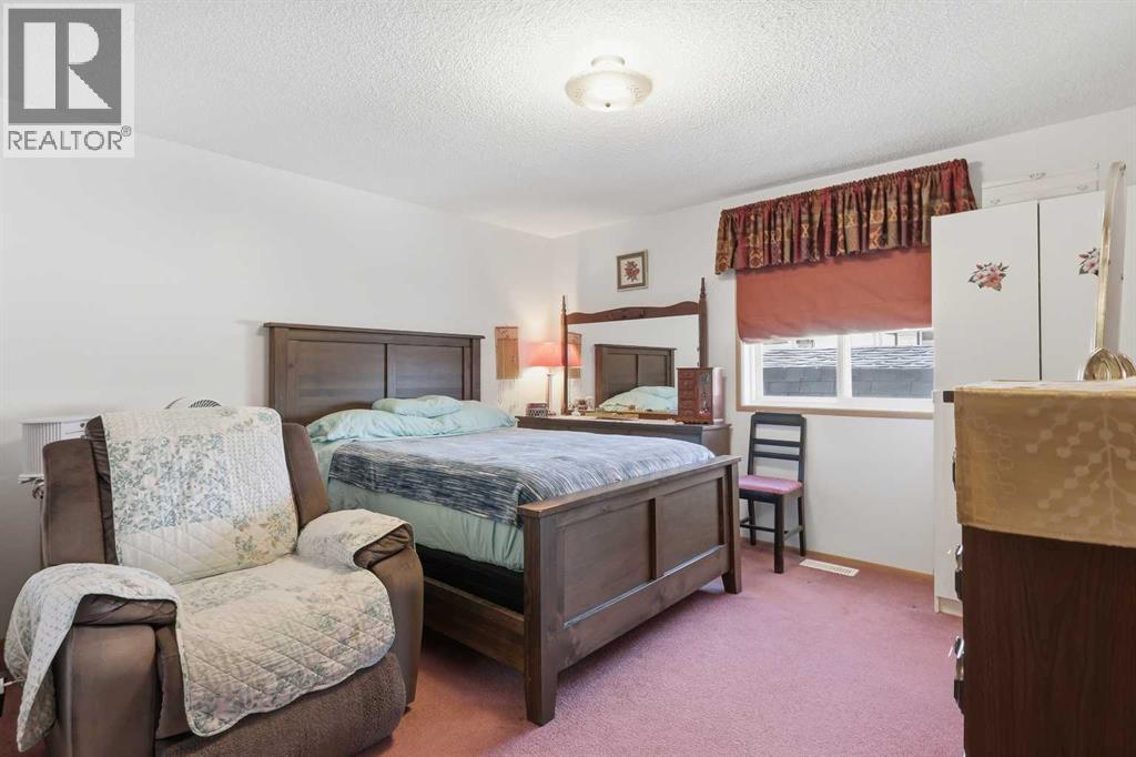 1, 900 Ross Street, Crossfield, Alberta  T0M 0S0 - Photo 12 - A2276345