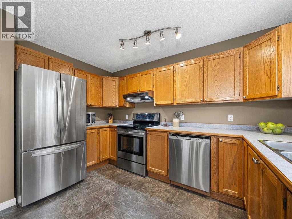 301 Arbour Cliff Close Nw, Calgary, Alberta  T3G 3W8 - Photo 12 - A2284425