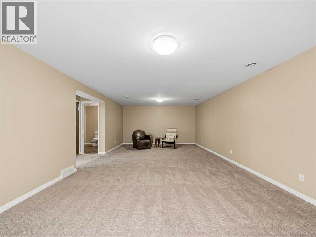 301 Arbour Cliff Close Nw, Calgary, Alberta  T3G 3W8 - Photo 21 - A2284425