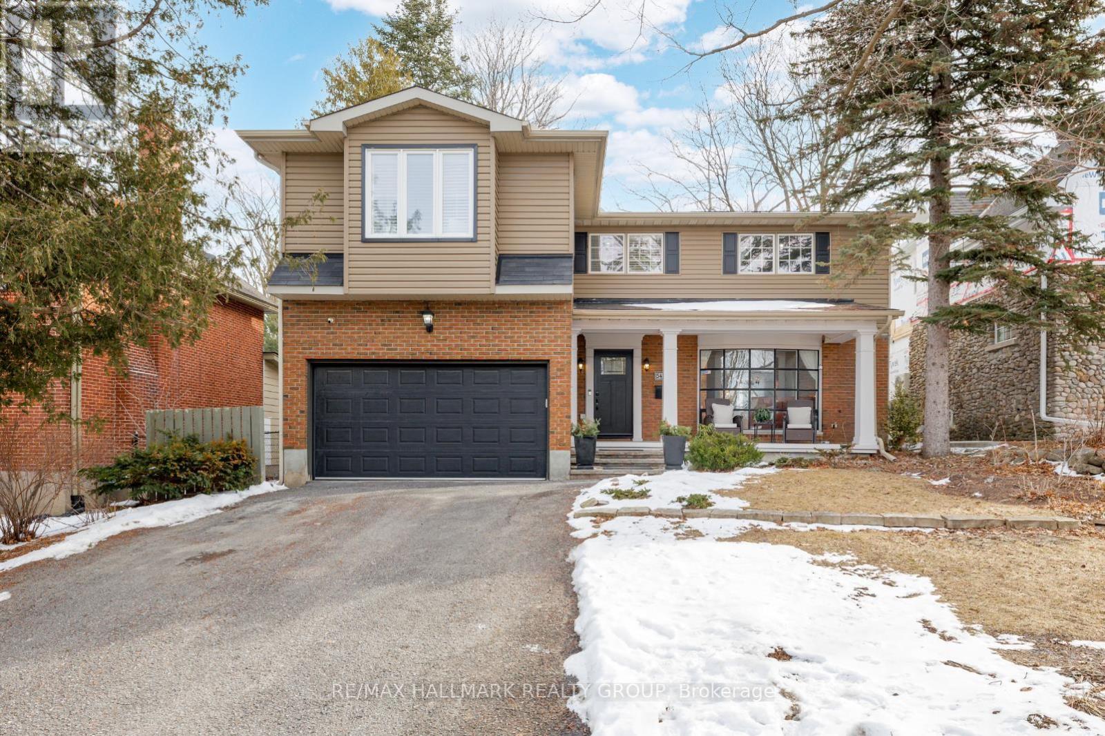 Beautiful and spacious TRUE 5-bedroom home, ideally situated in one of Ottawa's most coveted neighbourhoods - just steps to top-rated schools including Broadview PS, Nepean HS, and Notre Dame HS, along with Dovercourt Rec Centre, parks, the Farmers' Market at Byron Linear Park, and the boutiques and restaurants of Westboro Village. Exceptional curb appeal with a welcoming front verandah - an inviting spot to enjoy your morning coffee. Inside, the inviting living room is filled with natural light from an oversized bow window. The elegant formal dining room features a classic buffet cove, ideal for hosting large gatherings. The spacious kitchen offers granite countertops, centre island, and a seamless layout that flows into the family room with gas fireplace. A convenient main floor powder room completes this level. Hardwood flooring runs throughout both the main and second levels, complemented by a hardwood staircase. The expansive primary suite offers a true retreat, complete with built-in bench seating, two walk-in closets, and a spa-like 5-piece ensuite with dual sinks, marble tile, a soaker tub, and separate shower. Four additional well-sized bedrooms, each with large closets, along with an updated main bathroom complete the second level. The finished basement offers a large recreation room with beverage bar, a 2-piece bath, laundry area, and abundant storage. Outdoors, discover a private, fully fenced backyard oasis, thoughtfully designed with a covered deck (2021), hot tub, and interlock patio - an exceptional setting for relaxing or entertaining with family and friends. Enjoy the perfect blend of urban convenience and neighbourhood charm - this is a home and lifestyle not to be missed! No conveyance of offers until Monday, March 30th at 1pm. (id:48254)