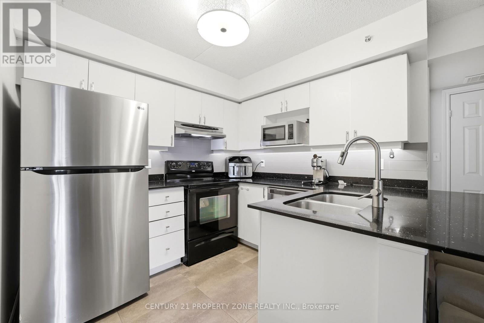 306 - 1440 Bishops Gate, Oakville (Ga Glen Abbey), Ontario  L6M 4M9 - Photo 12 - W12919226