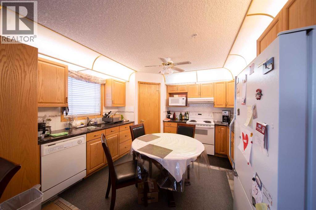 128, 6868 Sierra Morena Boulevard Sw, Calgary, Alberta  T3H 3R6 - Photo 14 - A2295290