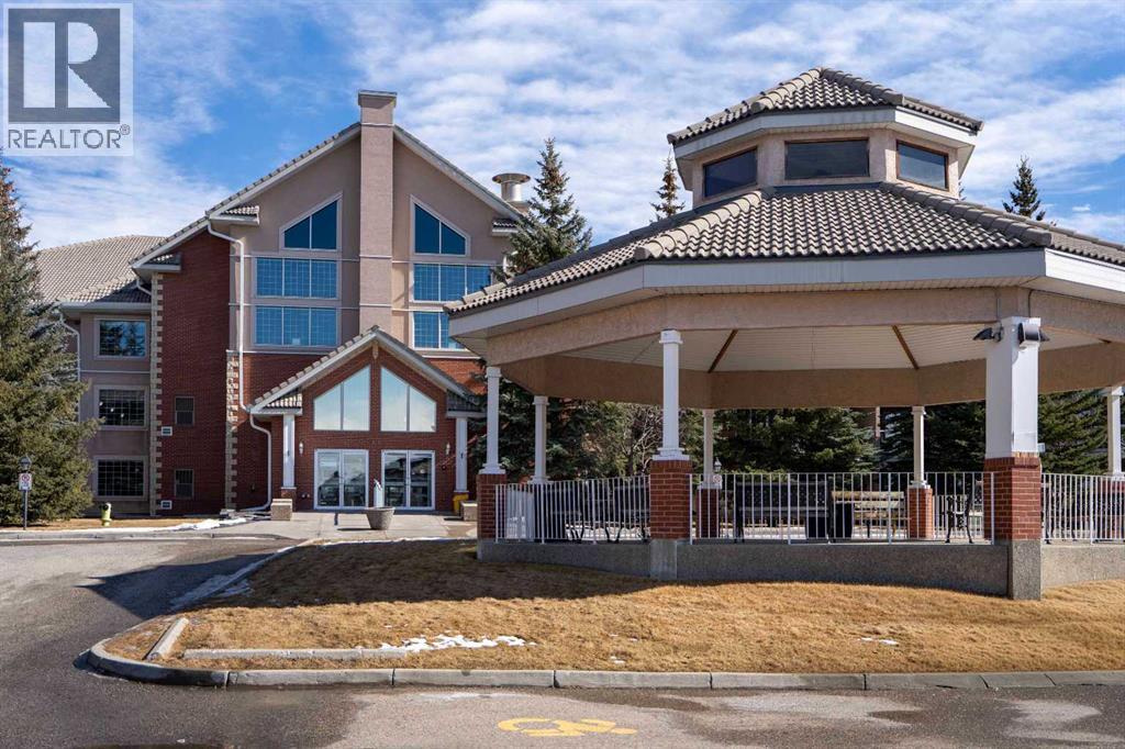 128, 6868 Sierra Morena Boulevard Sw, Calgary, Alberta  T3H 3R6 - Photo 1 - A2295290