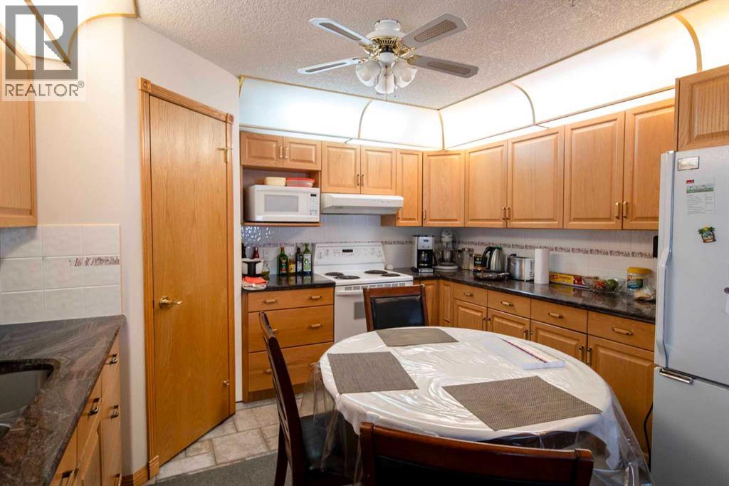 128, 6868 Sierra Morena Boulevard Sw, Calgary, Alberta  T3H 3R6 - Photo 12 - A2295290