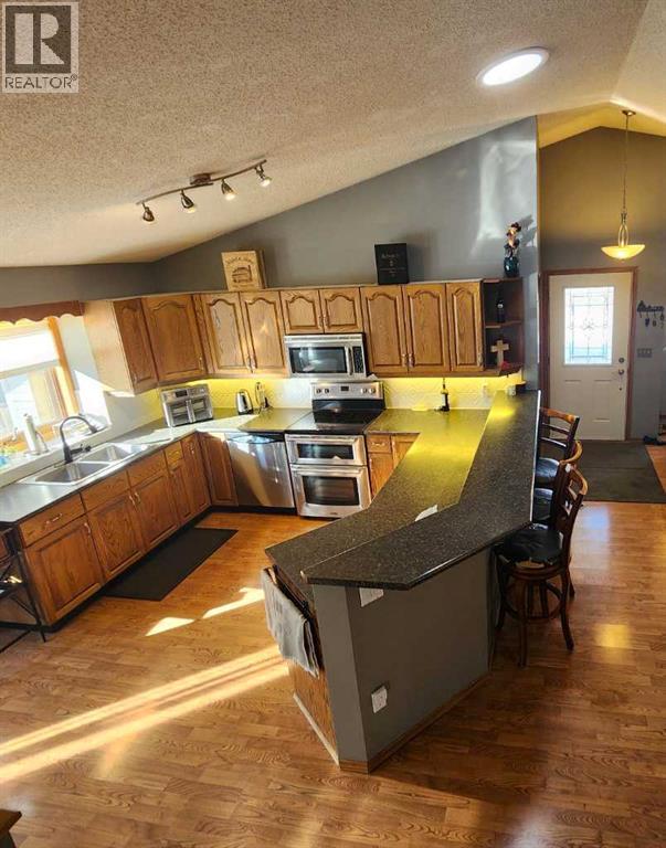 109 Downey Place, Okotoks, Alberta  T1S 1H3 - Photo 5 - A2295989