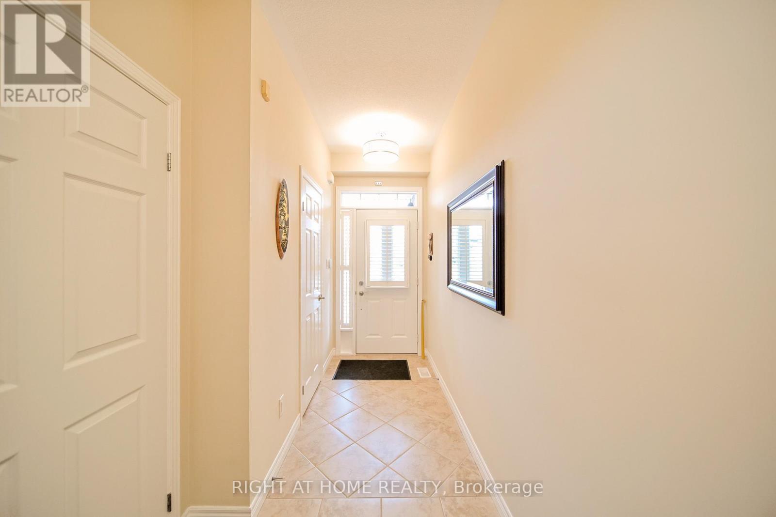 12 - 400 Stonehenge Drive, Hamilton (Meadowlands), Ontario  L9K 0A2 - Photo 5 - X12912200