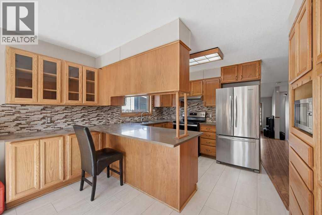 119 Macewan Meadow Way Nw, Calgary, Alberta  T3K 3H9 - Photo 9 - A2296106