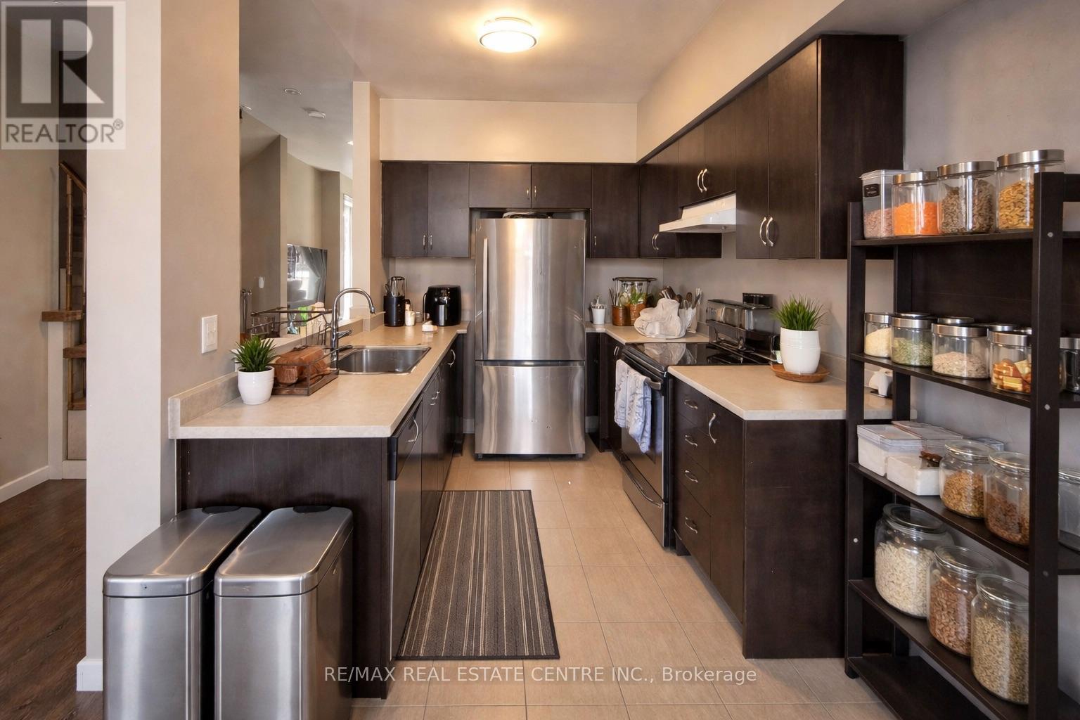 2491 Postmaster Drive, Oakville, Ontario  L6M 0L5 - Photo 3 - W12919564