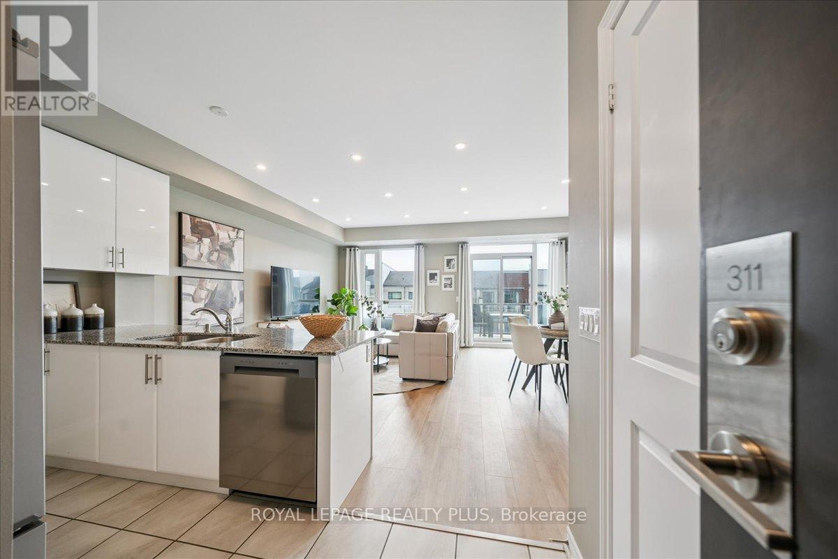 311 - 2370 Khalsa Gate, Oakville, Ontario  L6M 1P5 - Photo 2 - W12920062