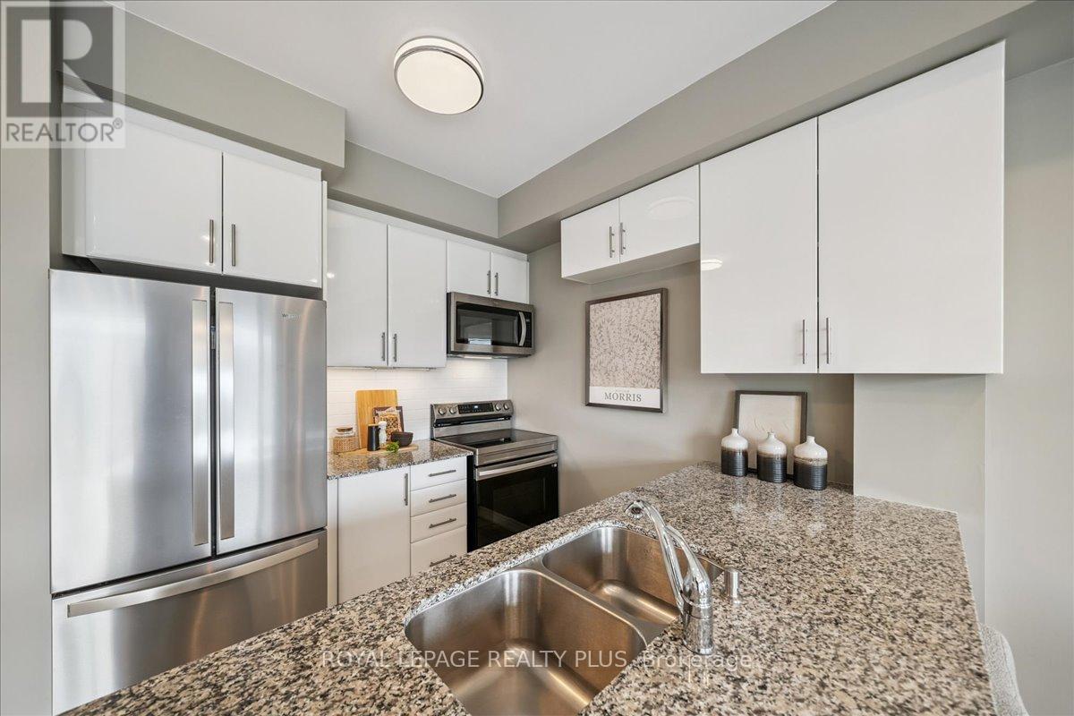 311 - 2370 Khalsa Gate, Oakville, Ontario  L6M 1P5 - Photo 4 - W12920062