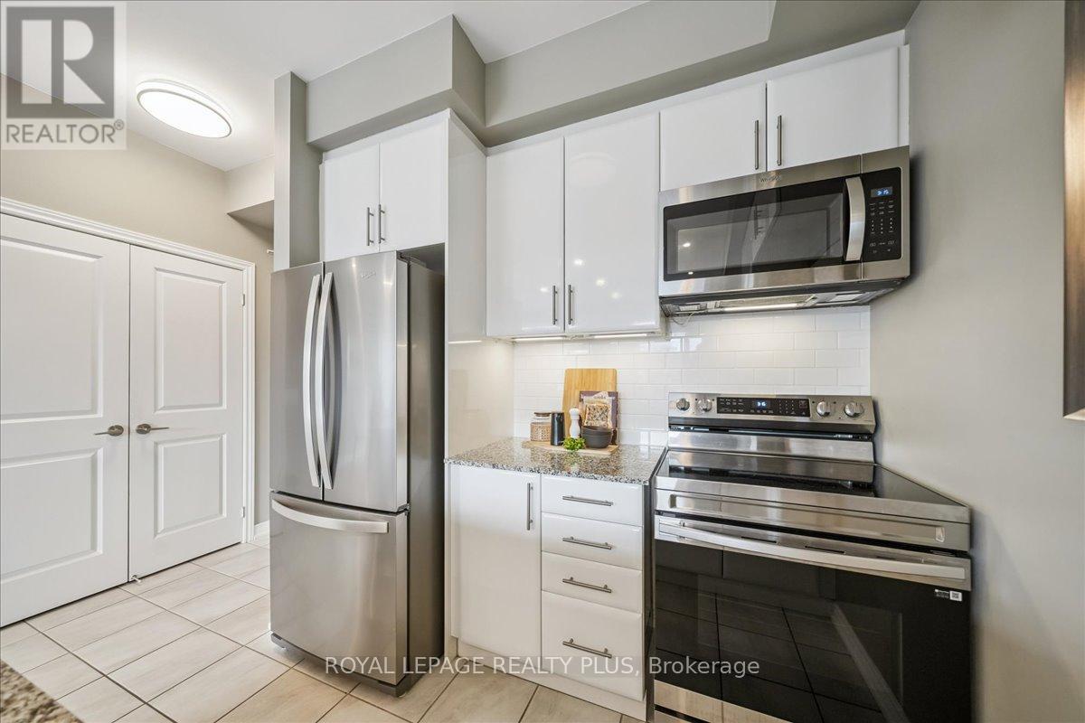 311 - 2370 Khalsa Gate, Oakville, Ontario  L6M 1P5 - Photo 5 - W12920062